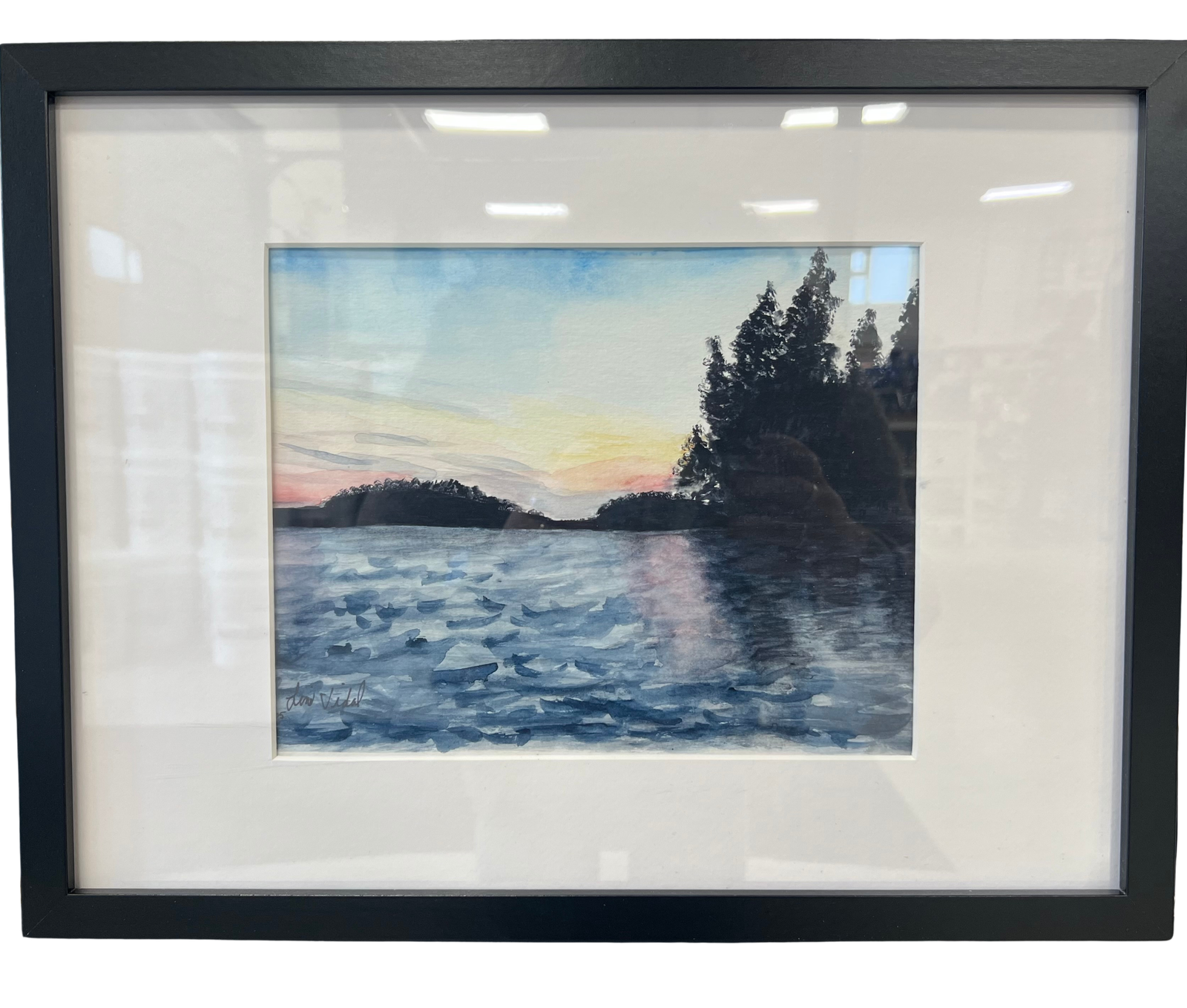 A painting by local Sudbury artist Line Vidal titled Sunrise at Beautiful Lake Temagami