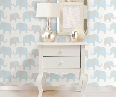 Blue elephant parade peel and stick wallpaper from Barrydowne Paint.